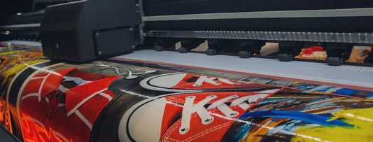 Production Printer printing a sublimation paper for swimwear